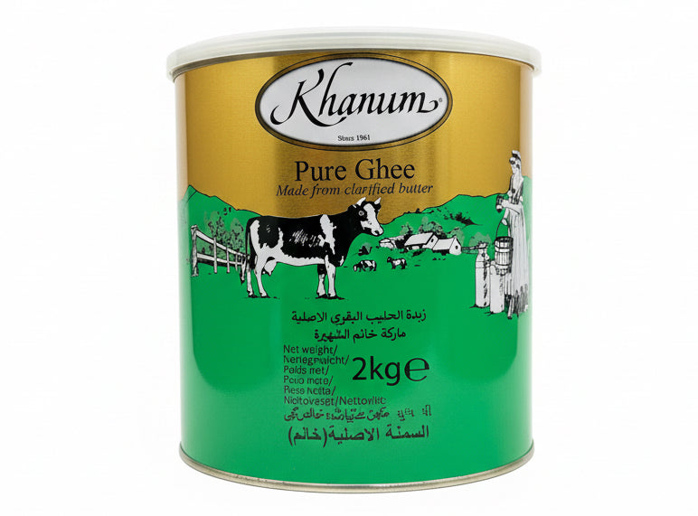 Khanum Pure Ghee container with green and gold design on a blurred background