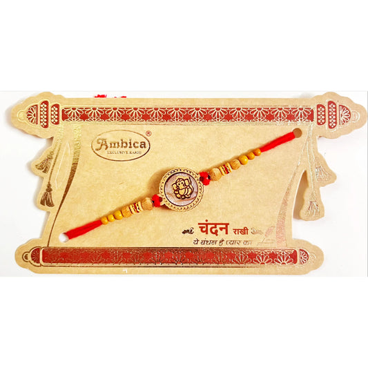 Buy Chandan Wooden Round Ganesha Red Thread Rakhi Online