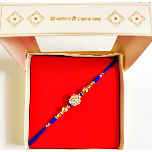 Buy Diamond Flower Blue Thread Golden Beads Rakhi Online